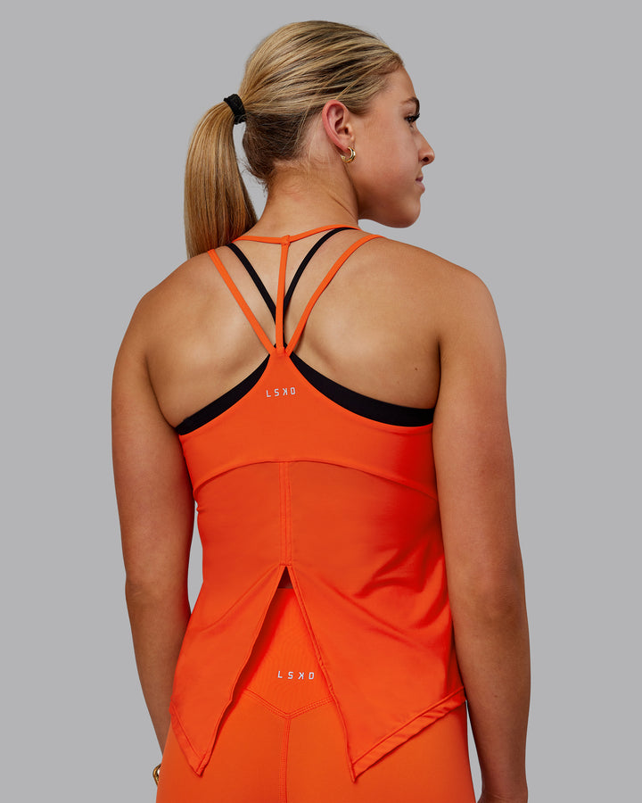 Woman wearing Apex Lightweight Performance Tank - Grenadine
