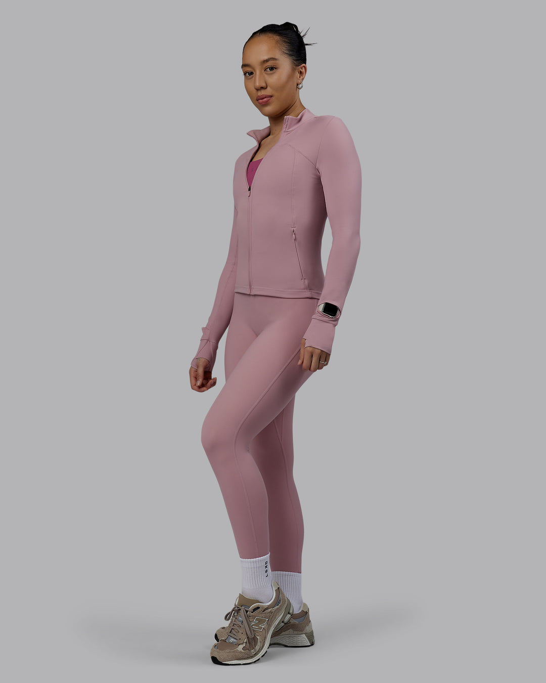 Woman wearing Aspire Jacket - Cosmetic Pink