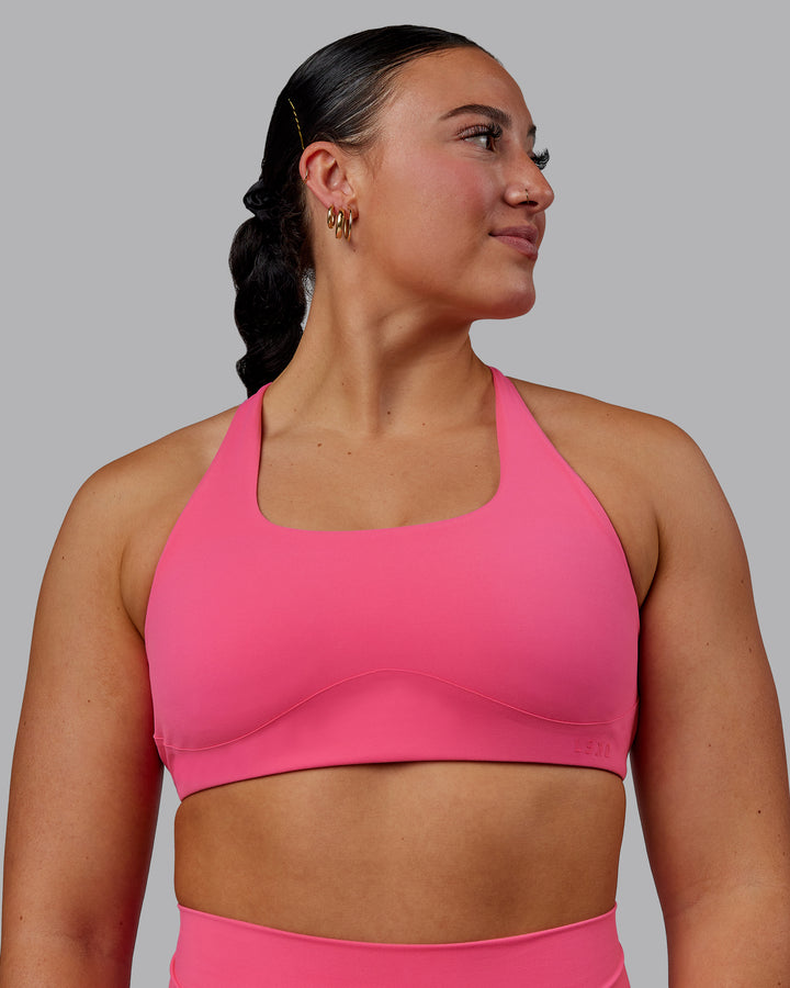 Woman wearing Aspire Sports Bra - Carmine Rose
