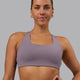 Woman wearing Aspire Sports Bra - Purple Sage