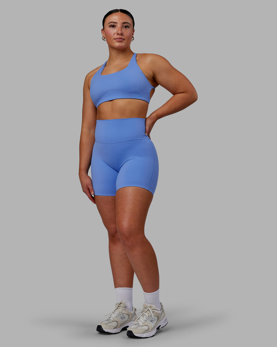 Woman wearing Aspire Sports Bra - Ultramarine