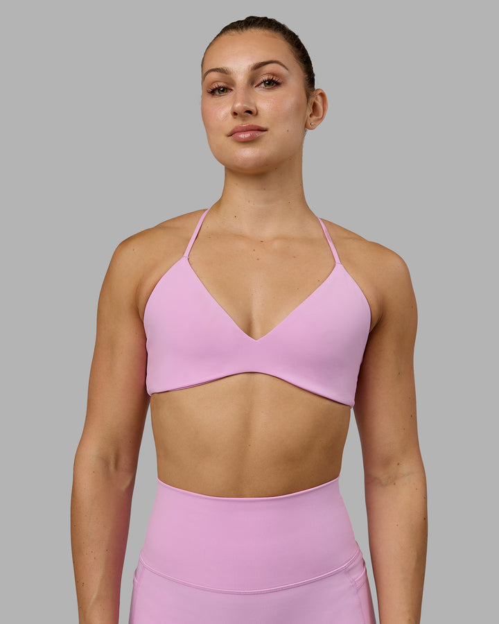 Woman wearing Aura Sports Bra - Pastel Orchid
