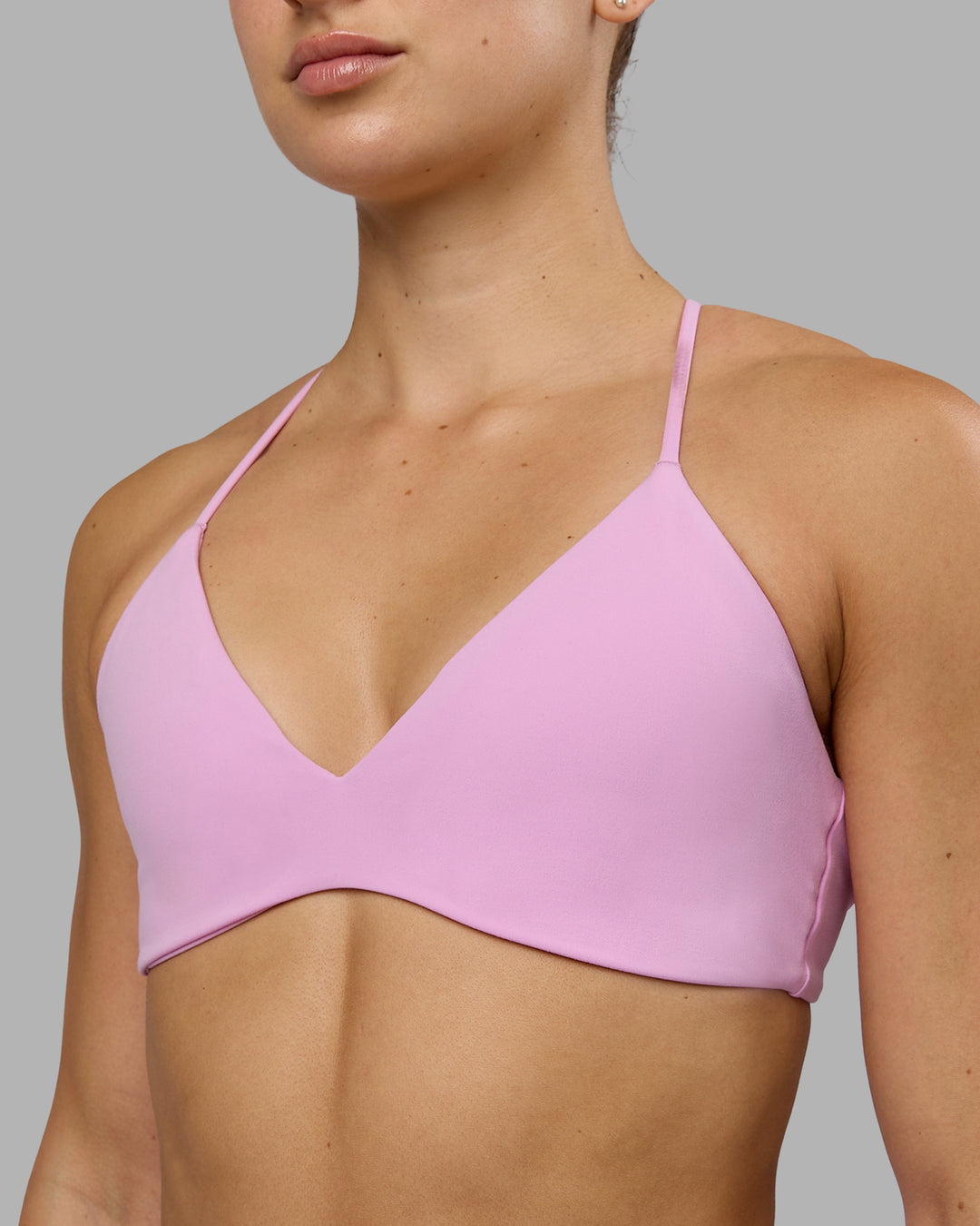 Woman wearing Aura Sports Bra - Pastel Orchid