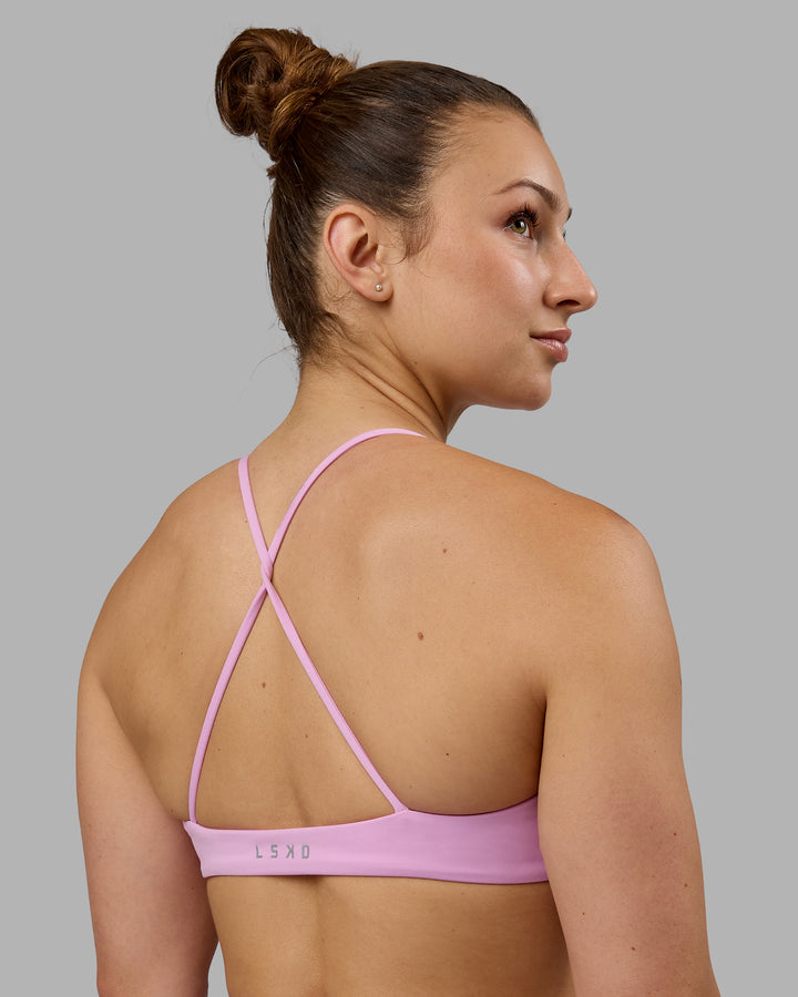 Woman wearing Aura Sports Bra - Pastel Orchid
