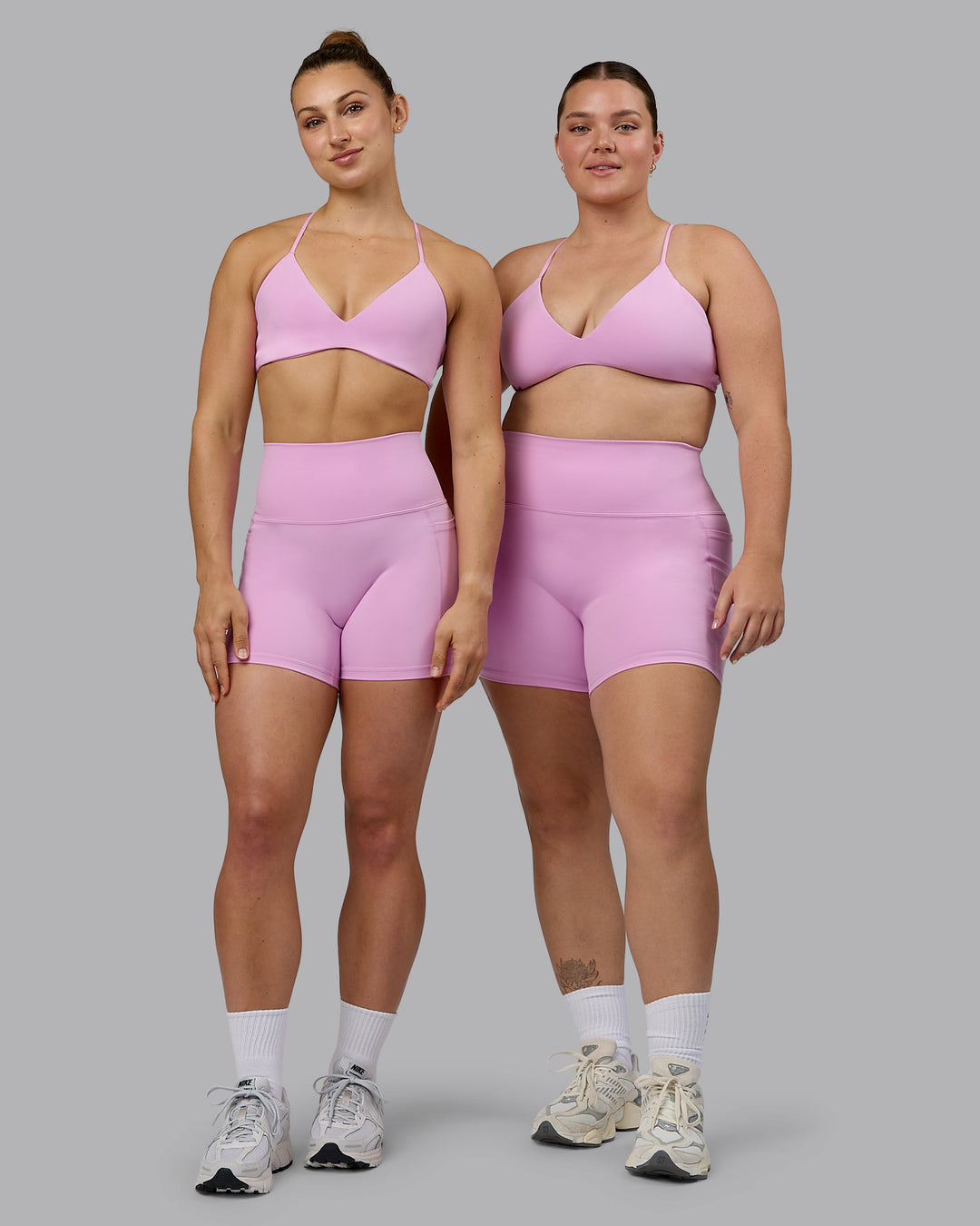 Woman wearing Aura Sports Bra - Pastel Orchid