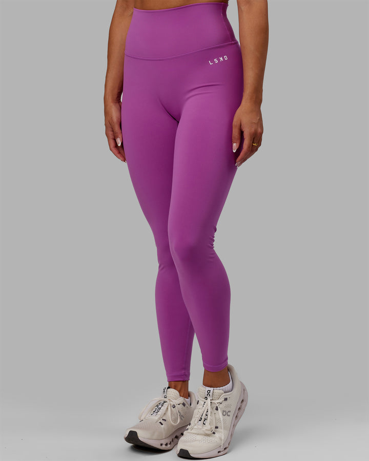 Woman wearing Base 2.0 Full Length Tights - Hyper Violet
