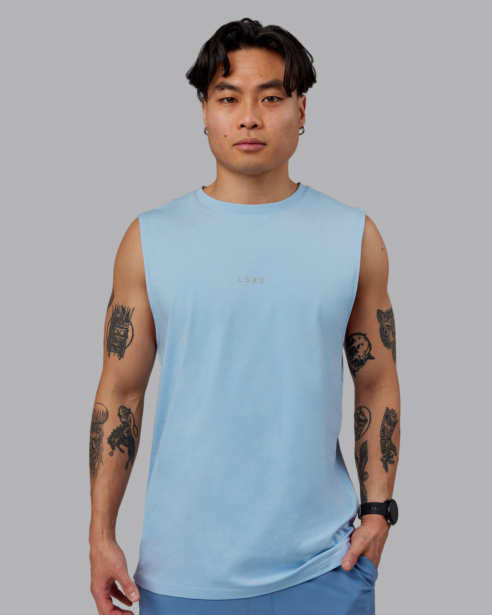 Man wearing Base FLXCotton Tank - Ice Blue