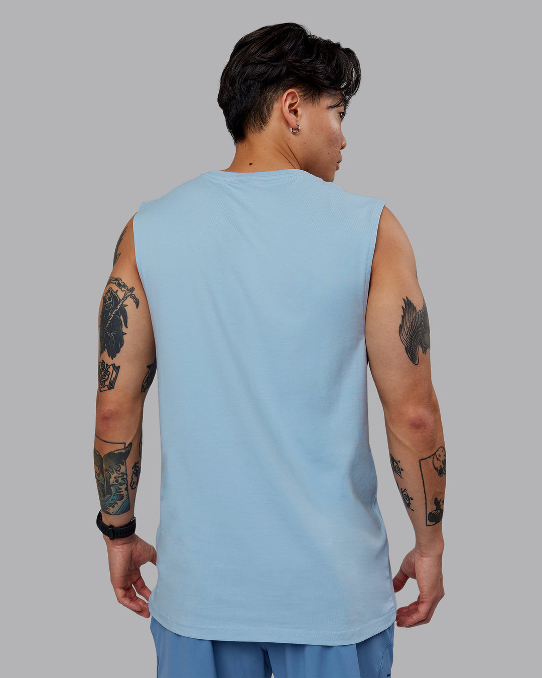 Man wearing Base FLXCotton Tank - Ice Blue