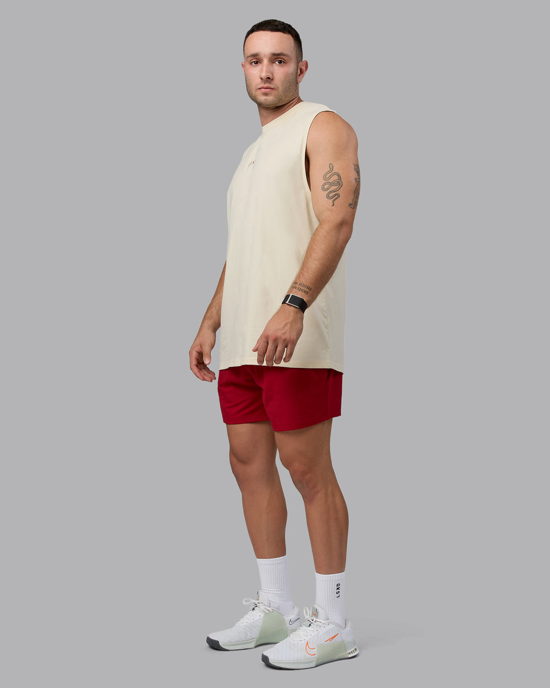 Man wearing Base FLXCotton Tank - Ivory-Cherry Red