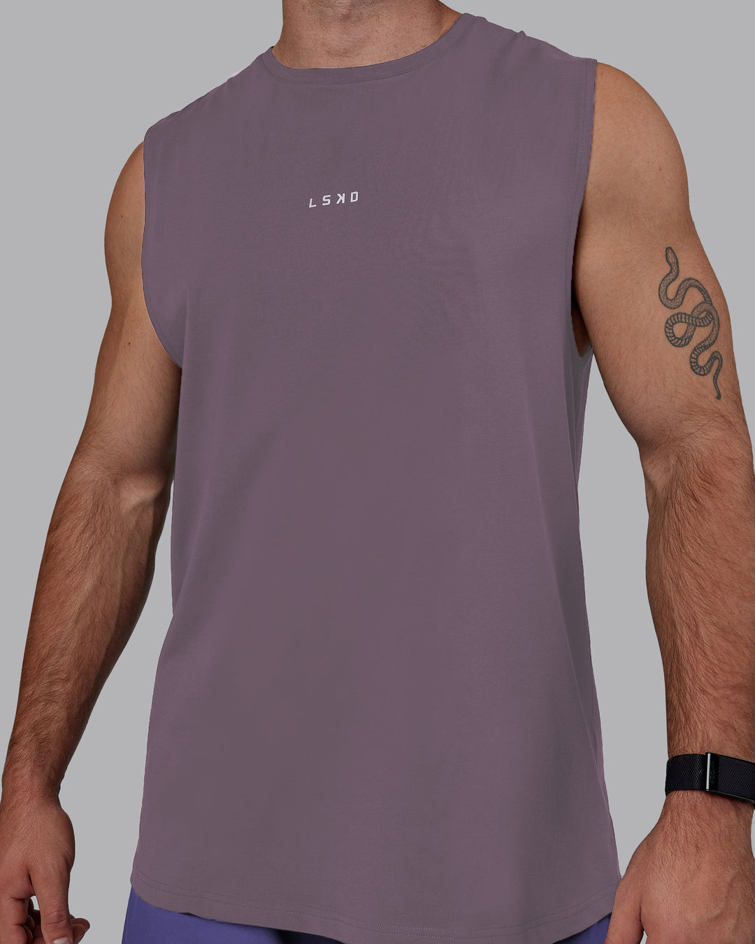 Man wearing Base FLXCotton Tank - Purple Sage