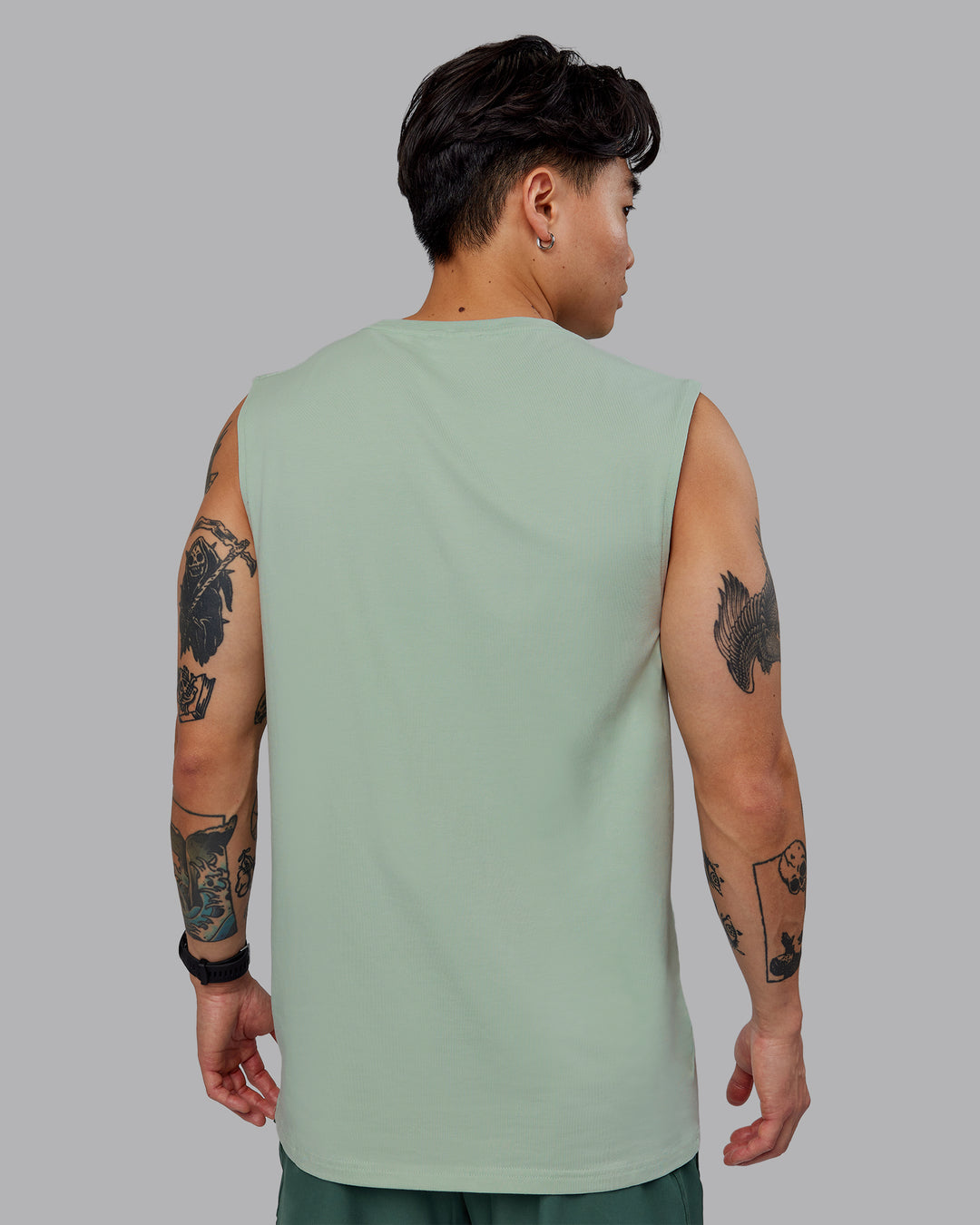 Man wearing Base FLXCotton Tank - Surf Spray