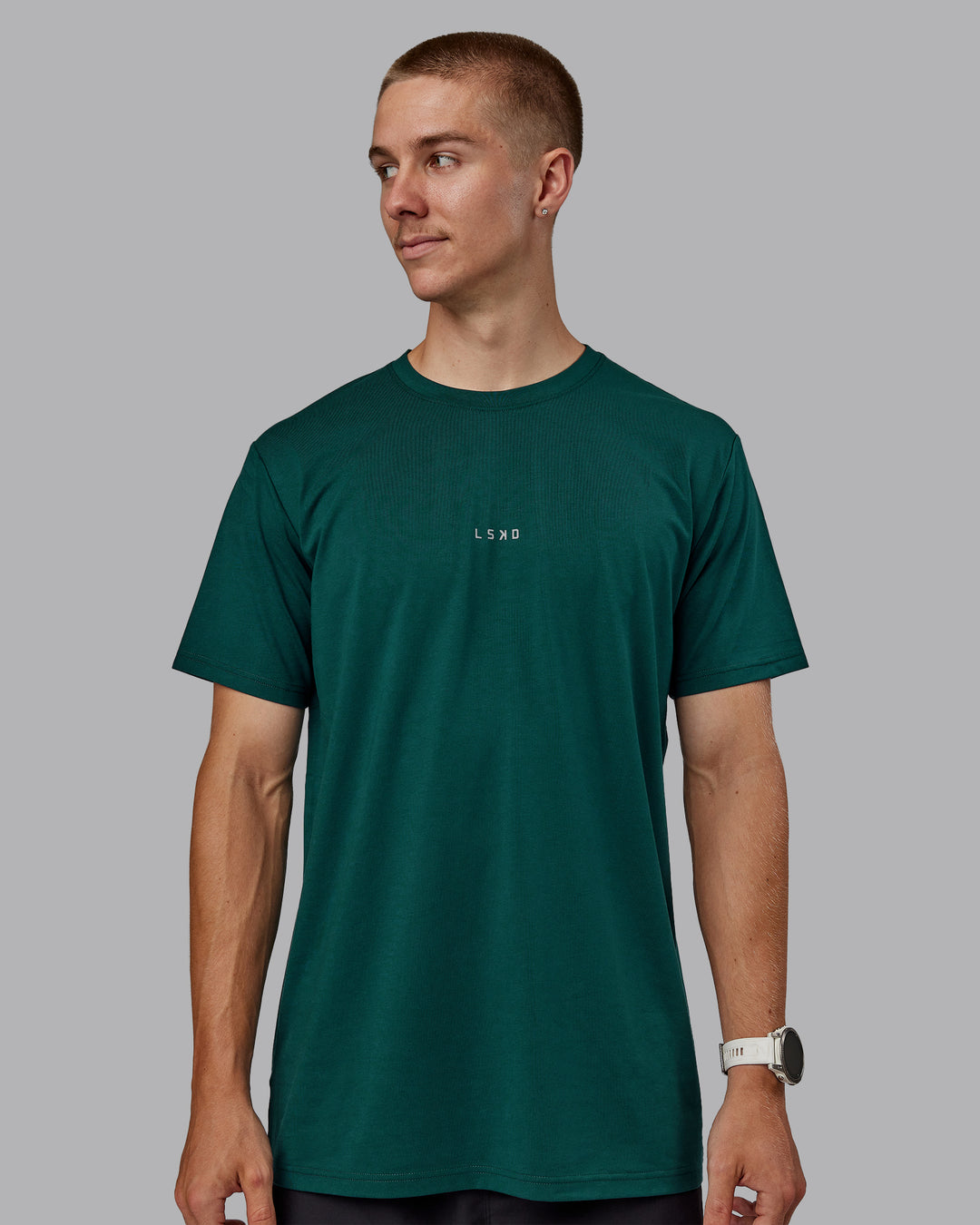 Man wearing Base FLXCotton Tee - Dark Moss