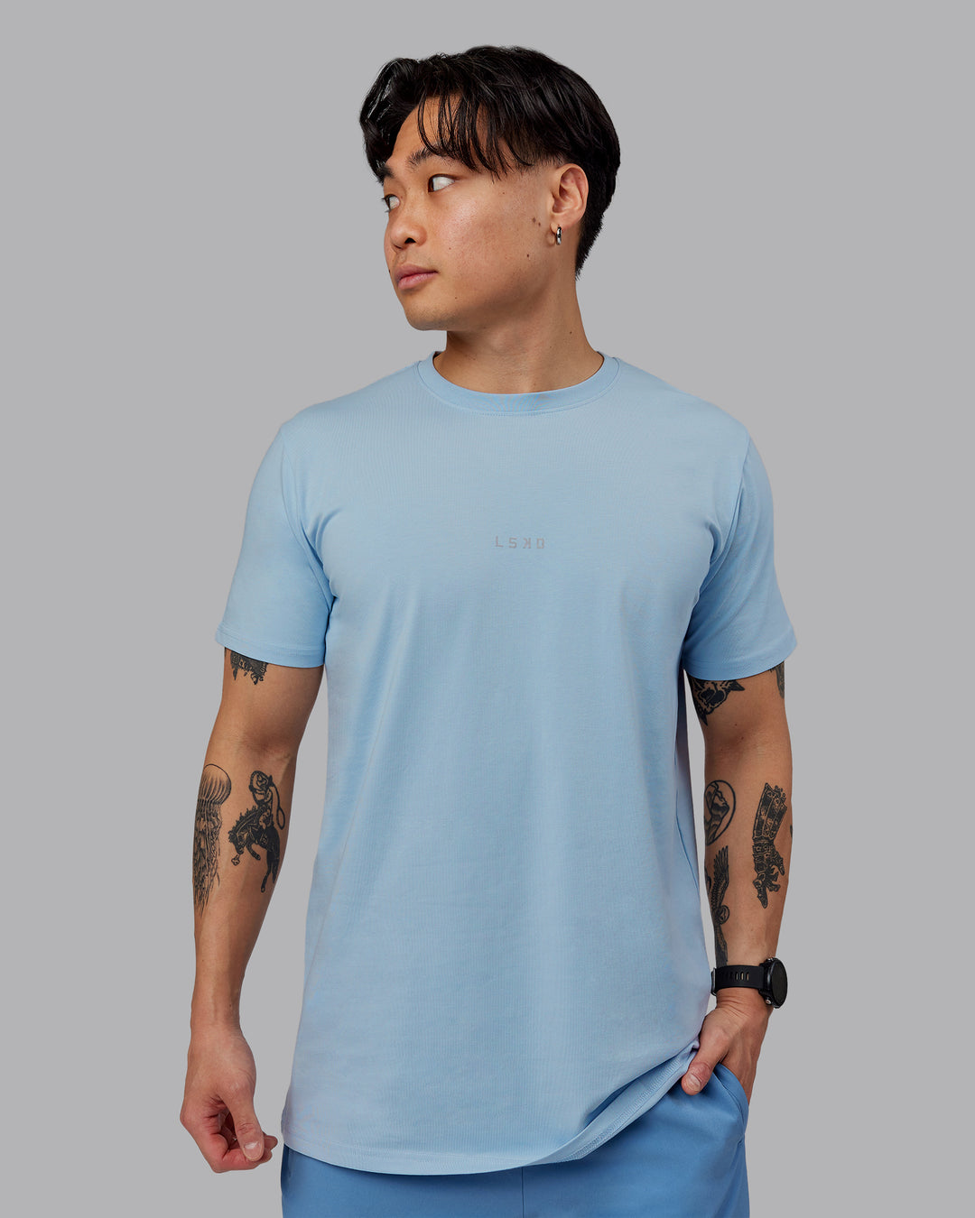 Man wearing Base FLXCotton Tee - Ice Blue