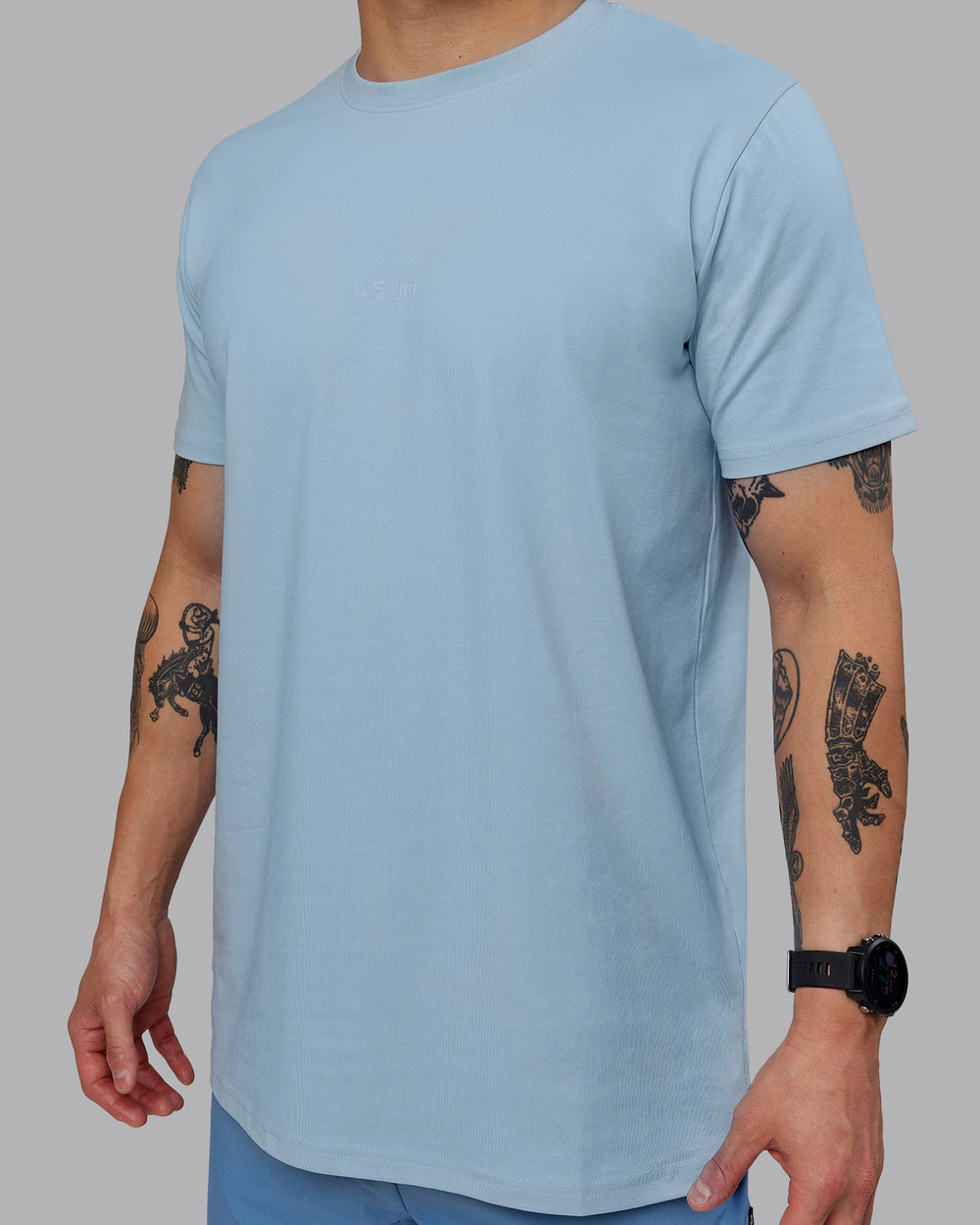 Man wearing Base FLXCotton Tee - Ice Blue