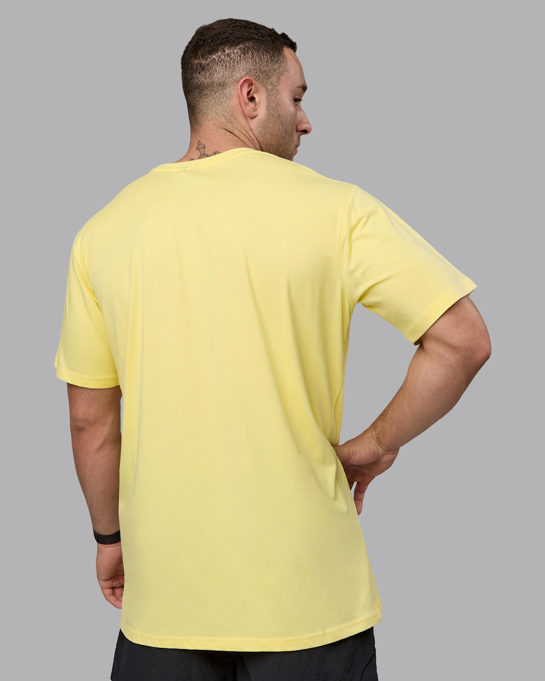 Man wearing Base FLXCotton Tee - Pale Yellow