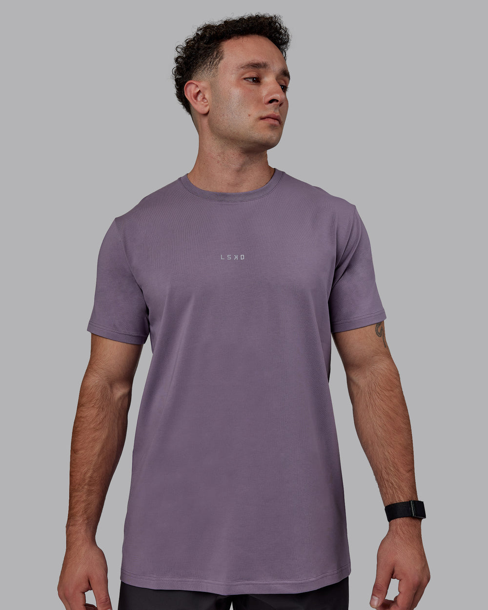 Man wearing Base FLXCotton Tee - Purple Sage