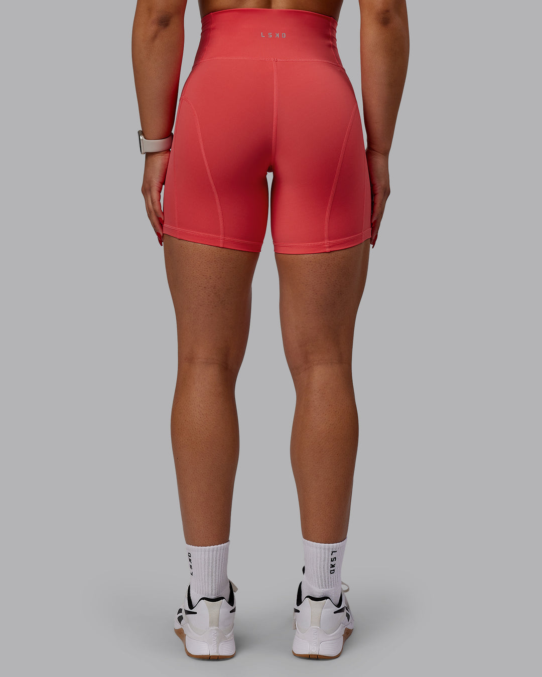 Woman wearing Bend Mid Short Tights - Cayenne