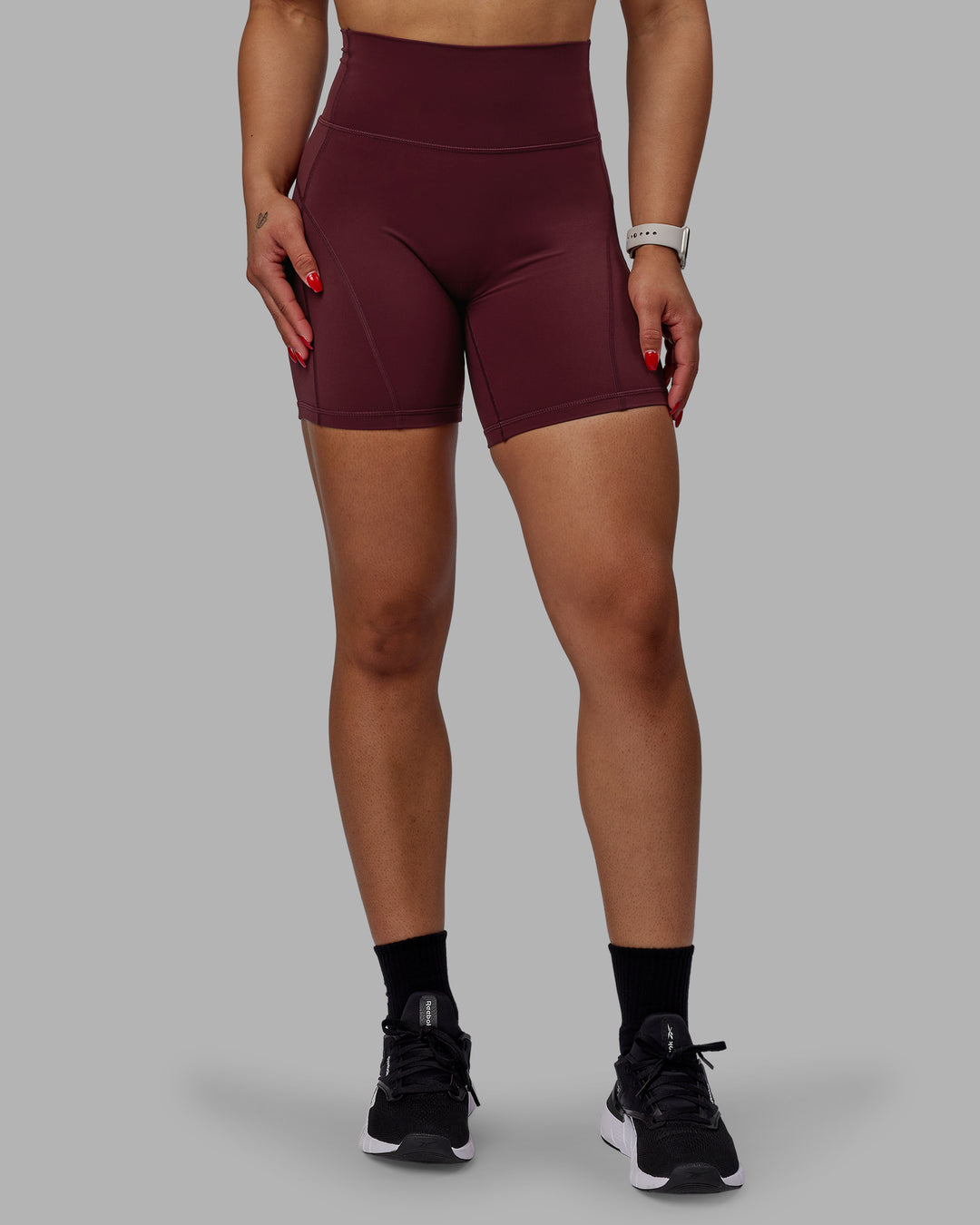 Woman wearing Bend Mid Short Tight - Dark Cherry