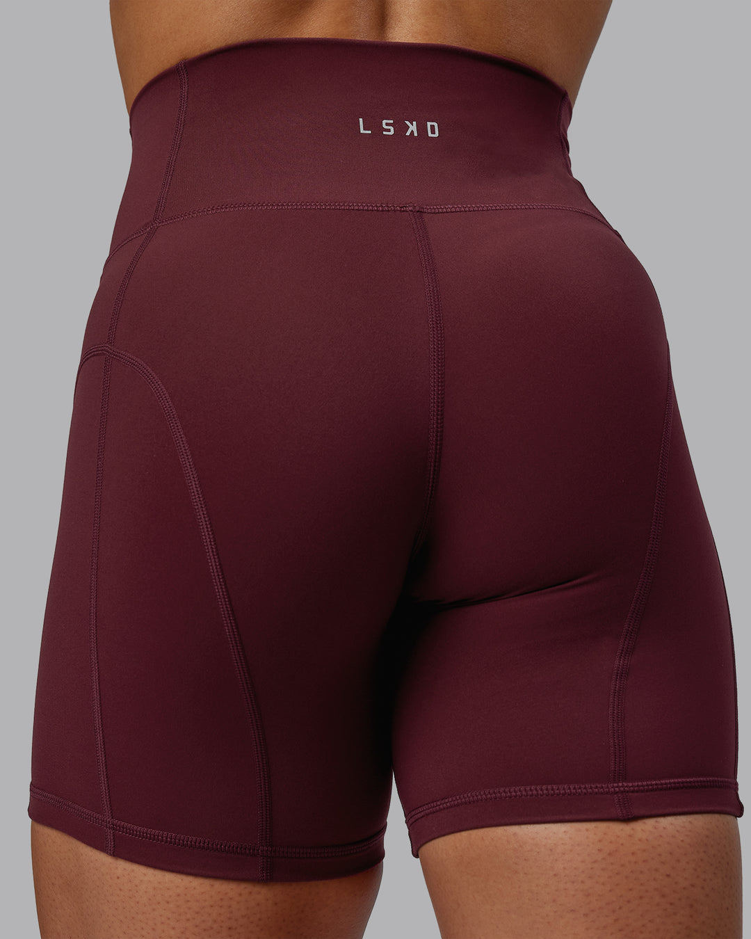 Woman wearing Bend Mid Short Tight - Dark Cherry