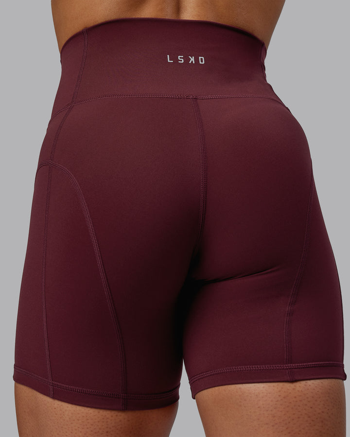 Woman wearing Bend Mid Short Tight - Dark Cherry
