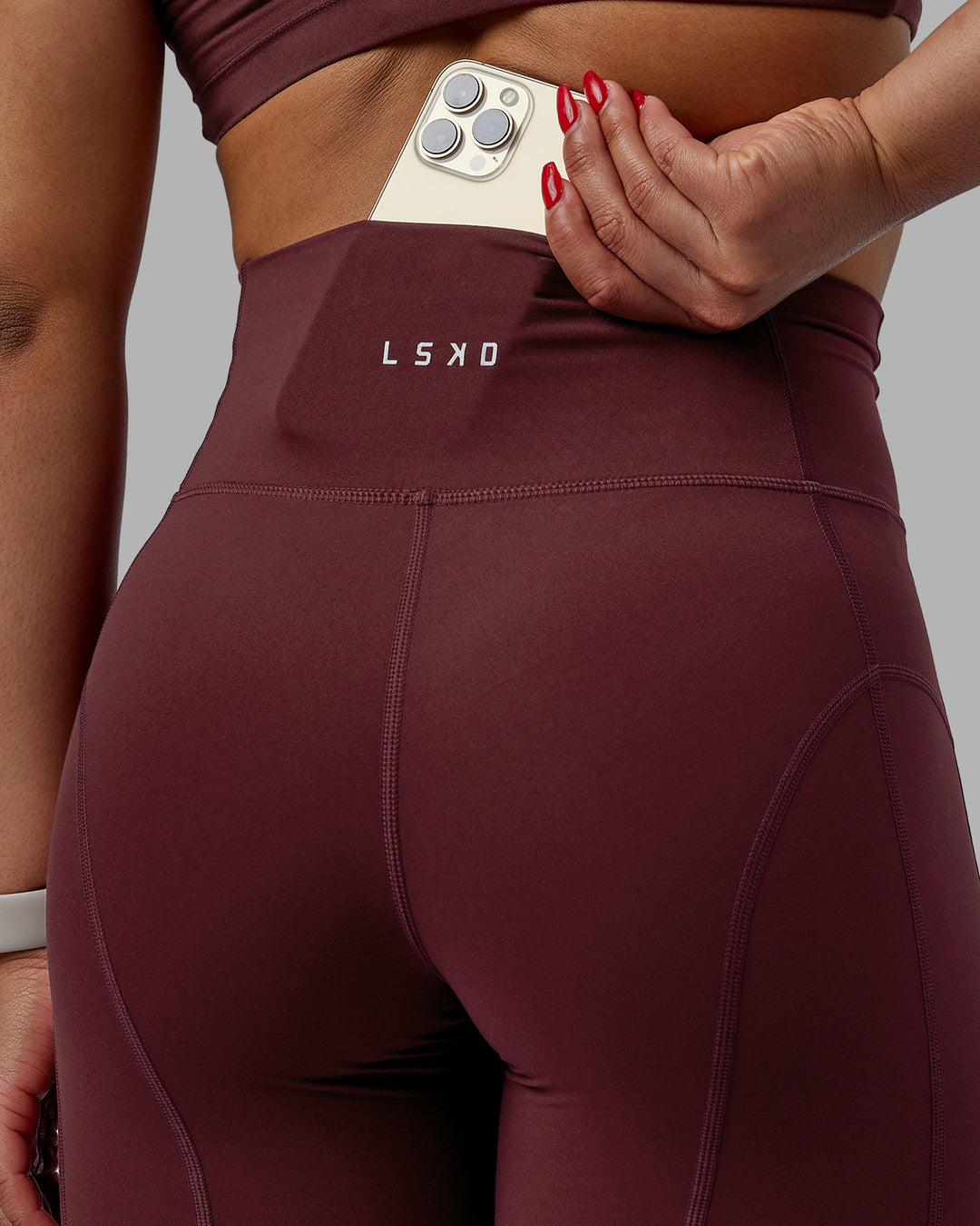 Woman wearing Bend Mid Short Tight - Dark Cherry