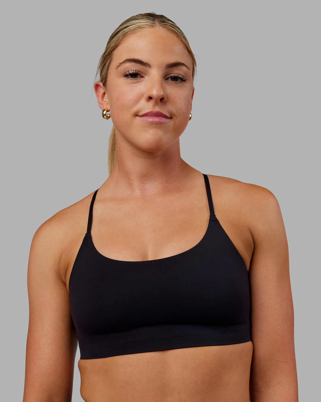 Woman wearing Bonded Sports Bra - Black