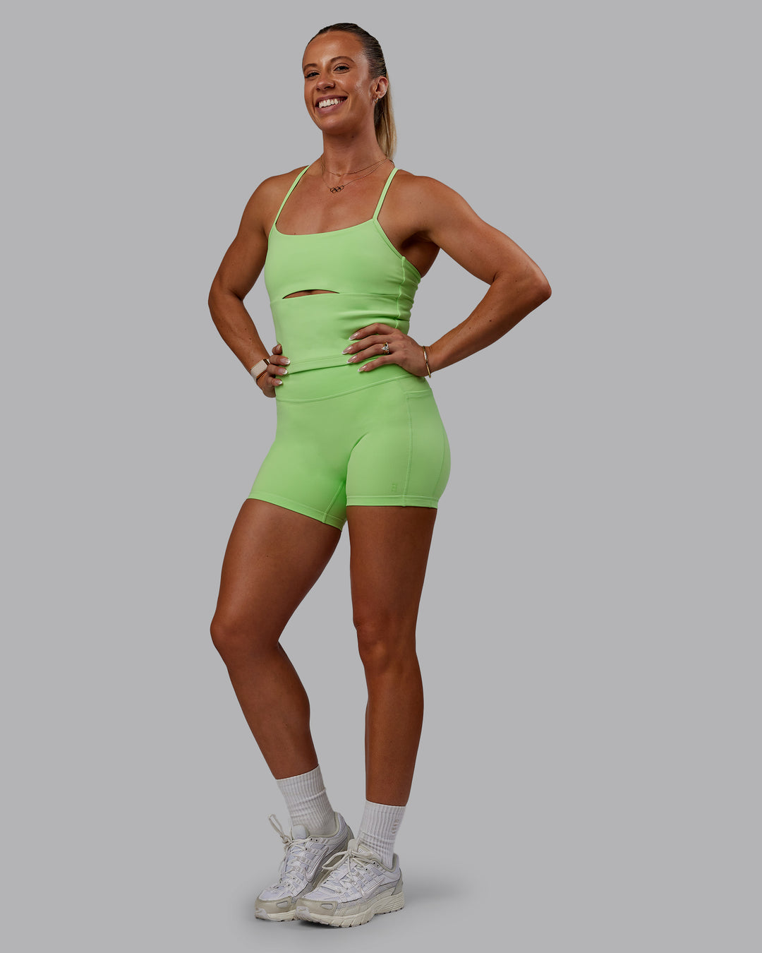 Woman wearing Bree Masters Form Shelf Bra Tank - Pastel Lime