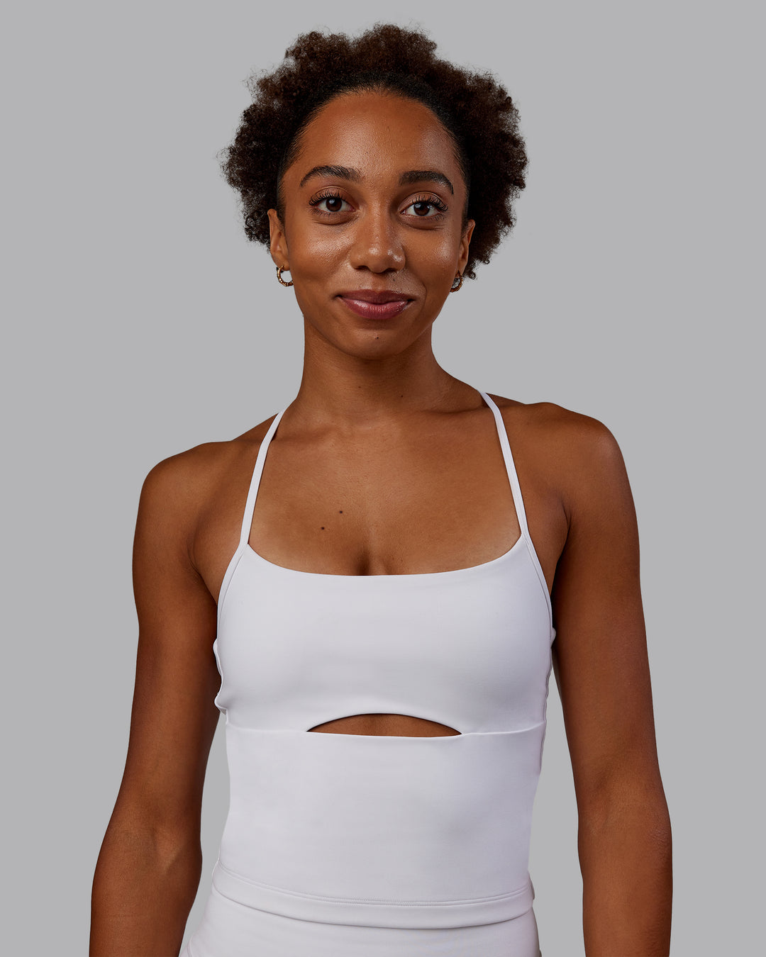 Woman wearing Bree Masters Form Shelf Bra Tank - White