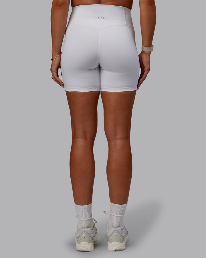 Woman wearing Bree Masters Fusion Mid Short Tights with Pockets - White
