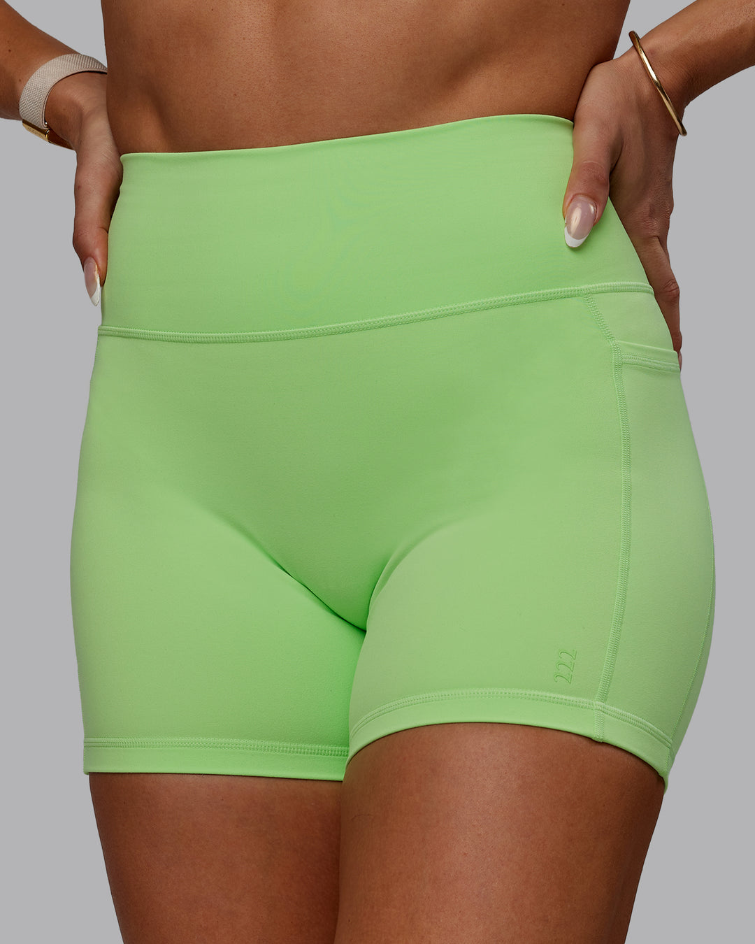 Woman wearing Bree Masters Fusion X-Short Tights with Pockets - Pastel Lime