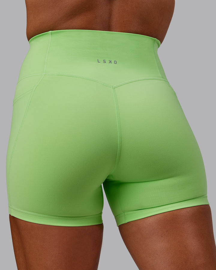 Woman wearing Bree Masters Fusion X-Short Tights with Pockets - Pastel Lime
