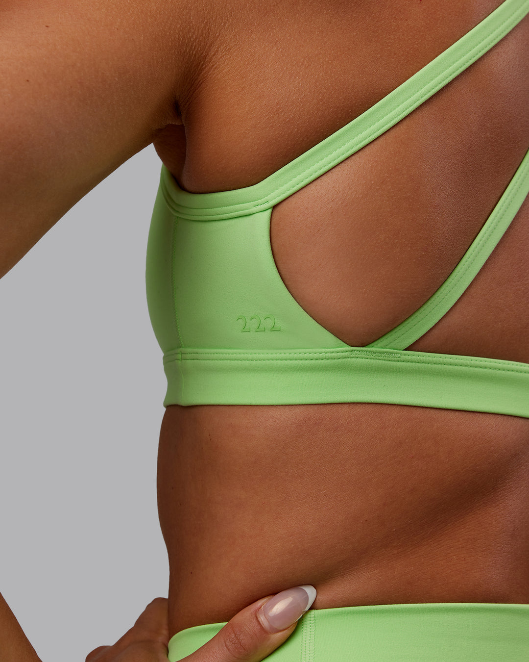 Woman wearing Bree Masters Velocity Sports Bra - Pastel Lime