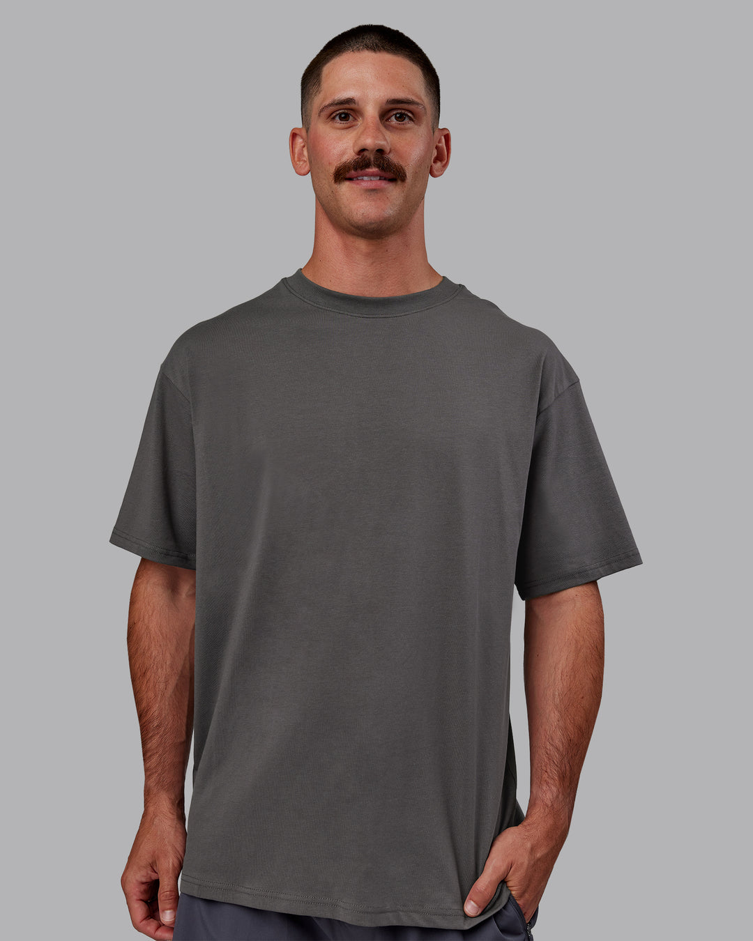 Man wearing Bree Masters Unisex Vision FLXCotton Tee Oversize - Stormy-Pastel Lime