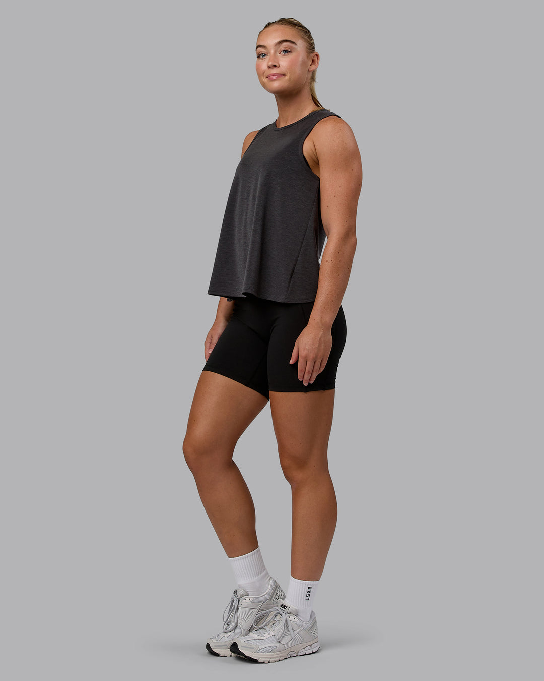 Woman wearing Breeze Training Tank - Black