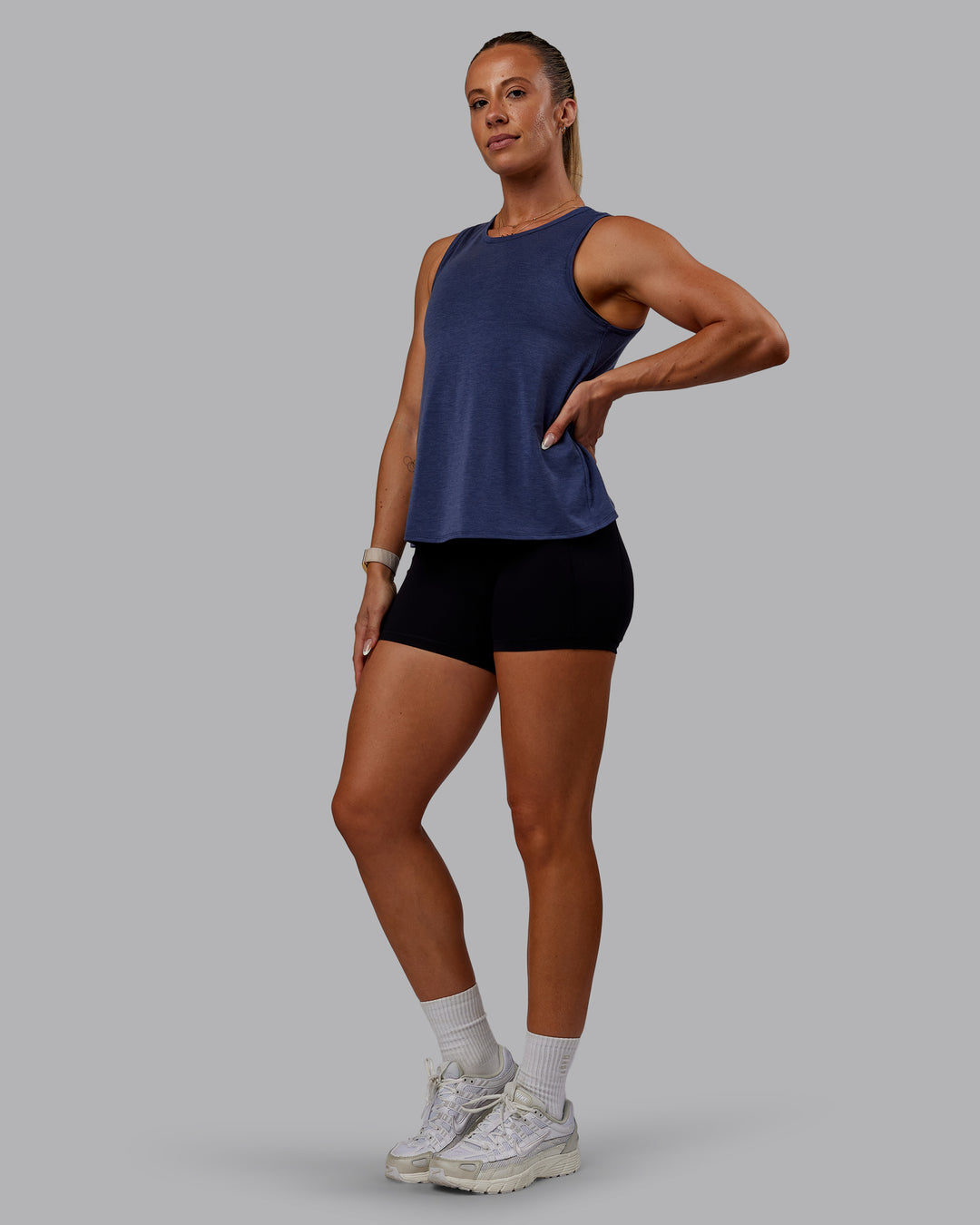 Woman wearing Breeze Training Tank - Future Navy