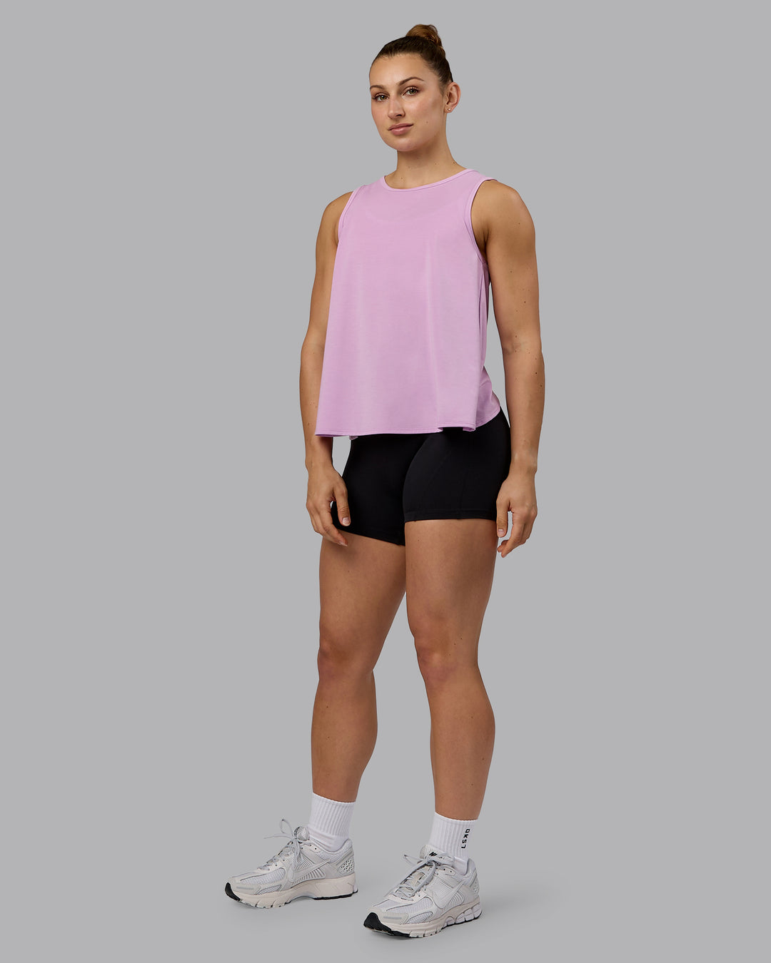 Woman wearing Breeze Training Tank - Pastel Orchid