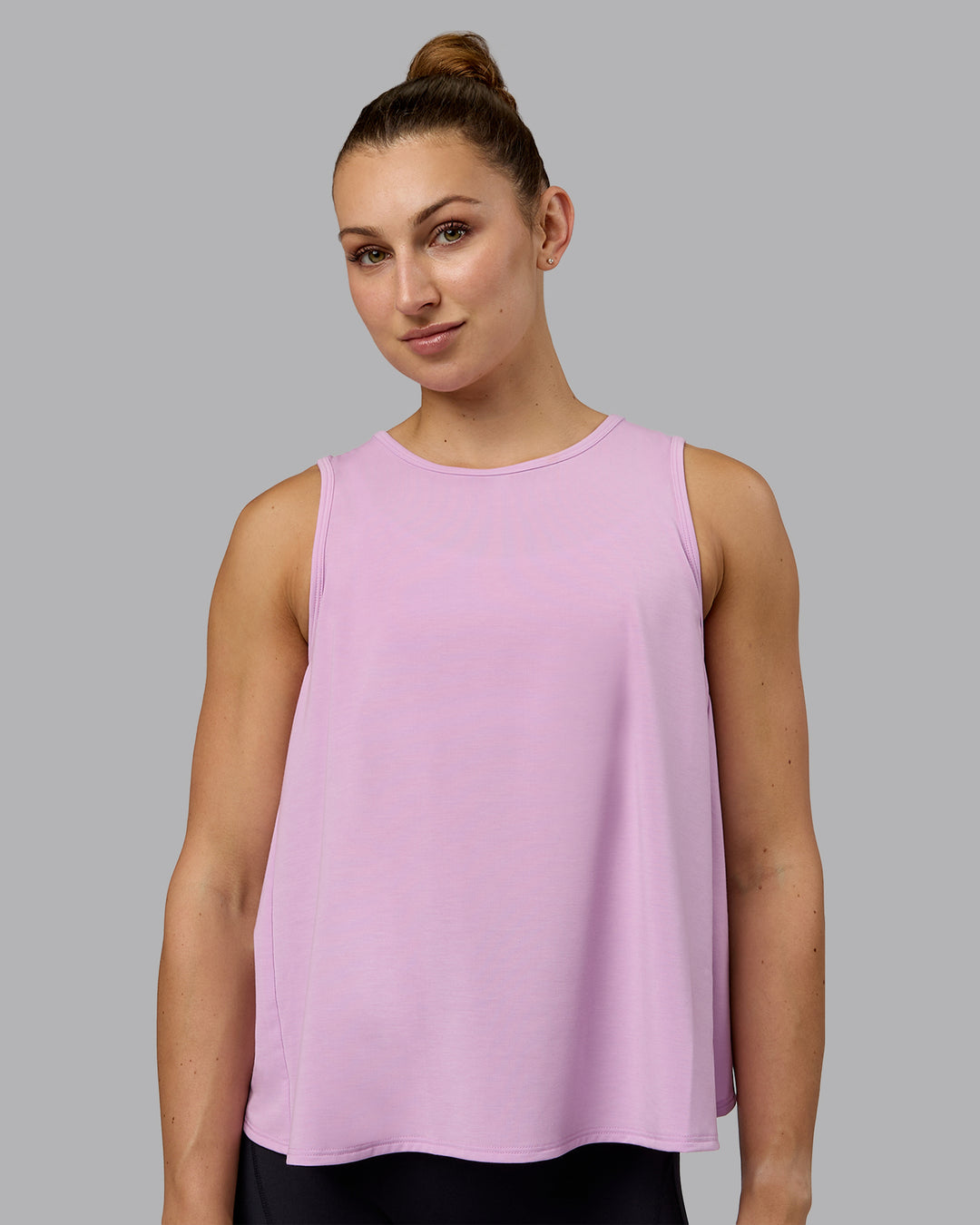 Woman wearing Breeze Training Tank - Pastel Orchid