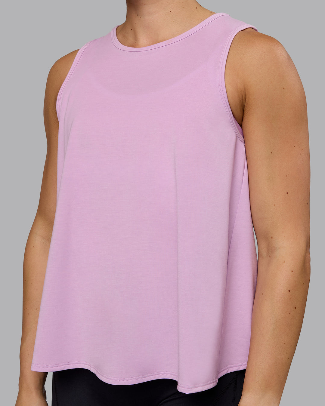 Woman wearing Breeze Training Tank - Pastel Orchid