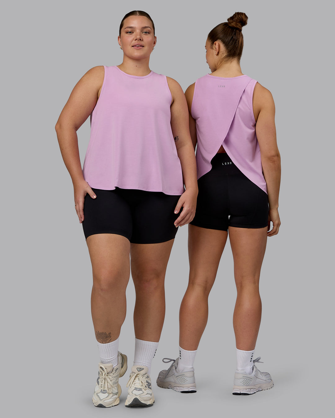 Woman wearing Breeze Training Tank - Pastel Orchid