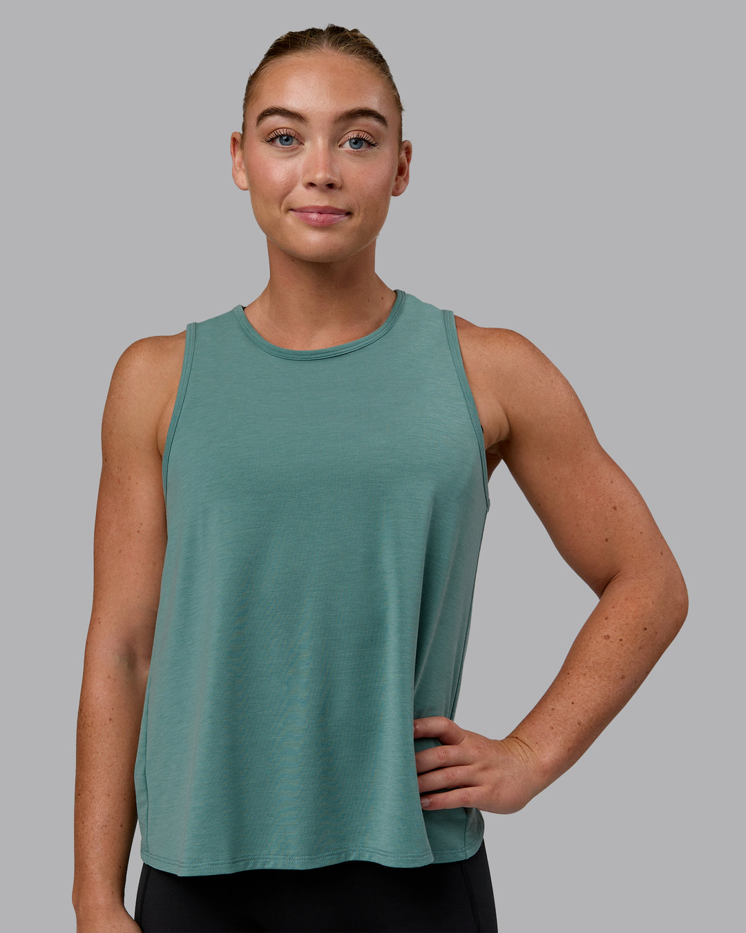 Woman wearing Breeze Training Tank - Sagebrush