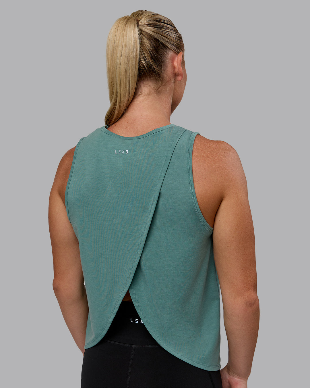 Woman wearing Breeze Training Tank - Sagebrush