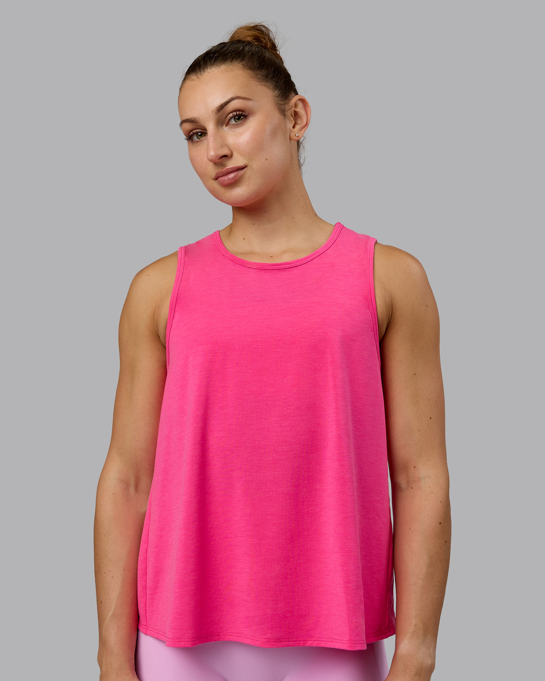 Woman wearing Breeze Training Tank - Ultra Pink