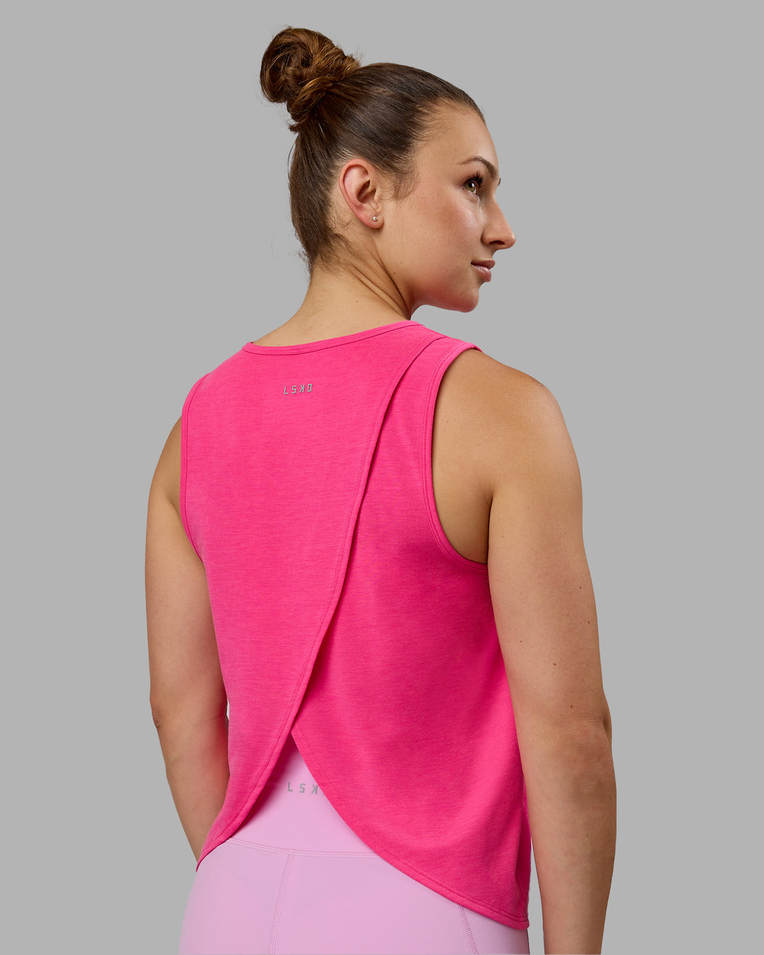 Woman wearing Breeze Training Tank - Ultra Pink