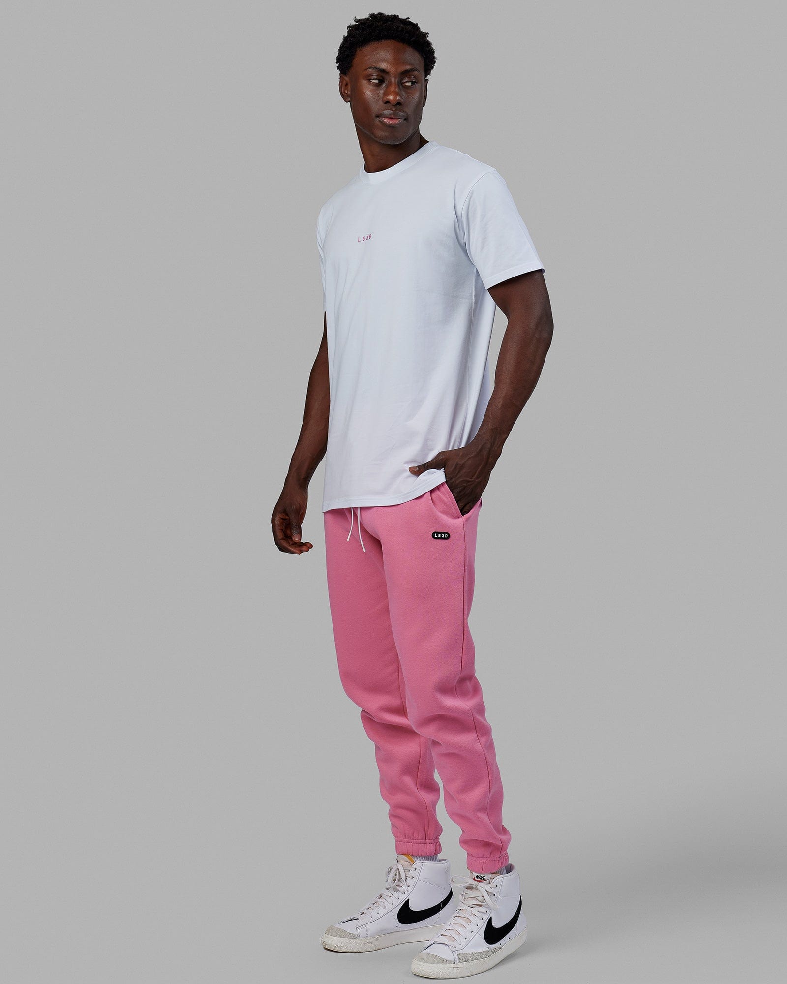 Nike track store pants pink