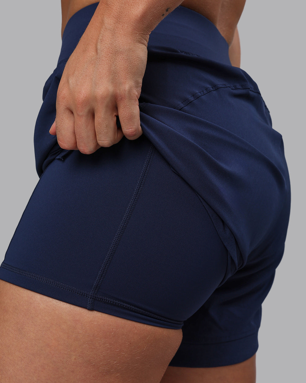 Woman wearing Challenger 5" Lined Performance Shorts - Future Navy