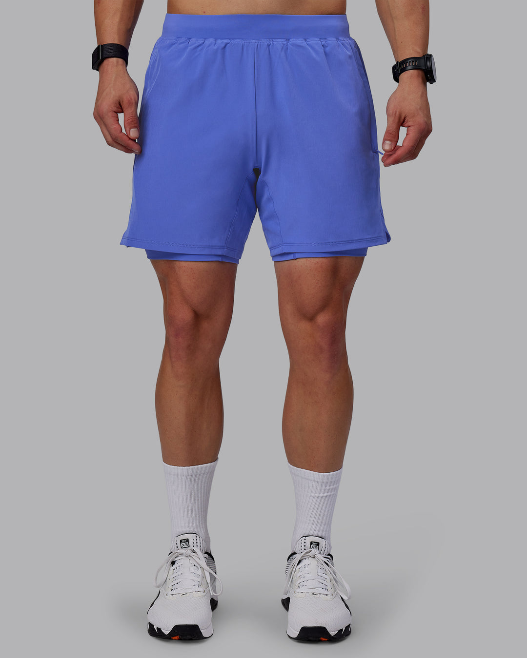 Man wearing Challenger 6&quot; Lined Performance Shorts - Baja Blue