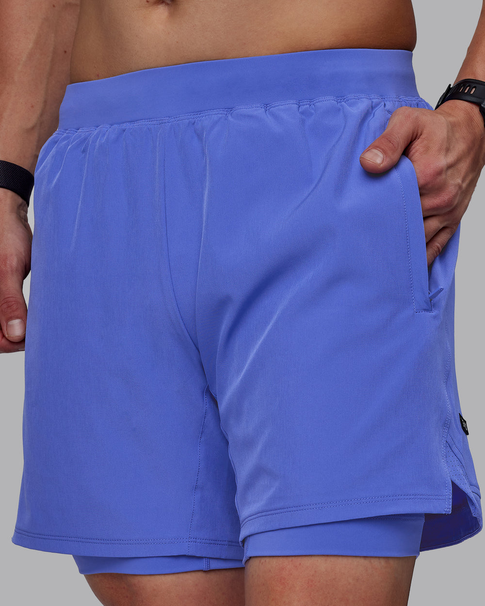 Man wearing Challenger 6" Lined Performance Shorts - Baja Blue