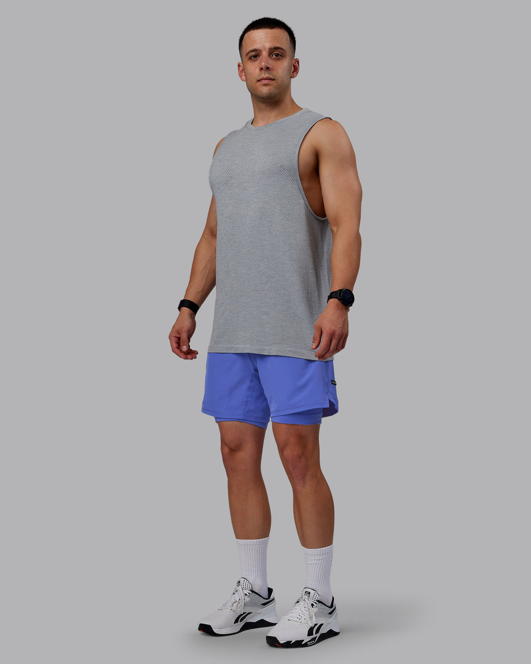 Man wearing Challenger 6&quot; Lined Performance Shorts - Baja Blue