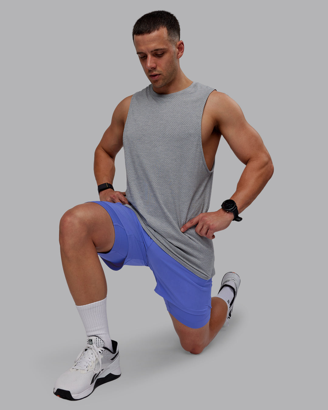 Man wearing Challenger 6&quot; Lined Performance Shorts - Baja Blue