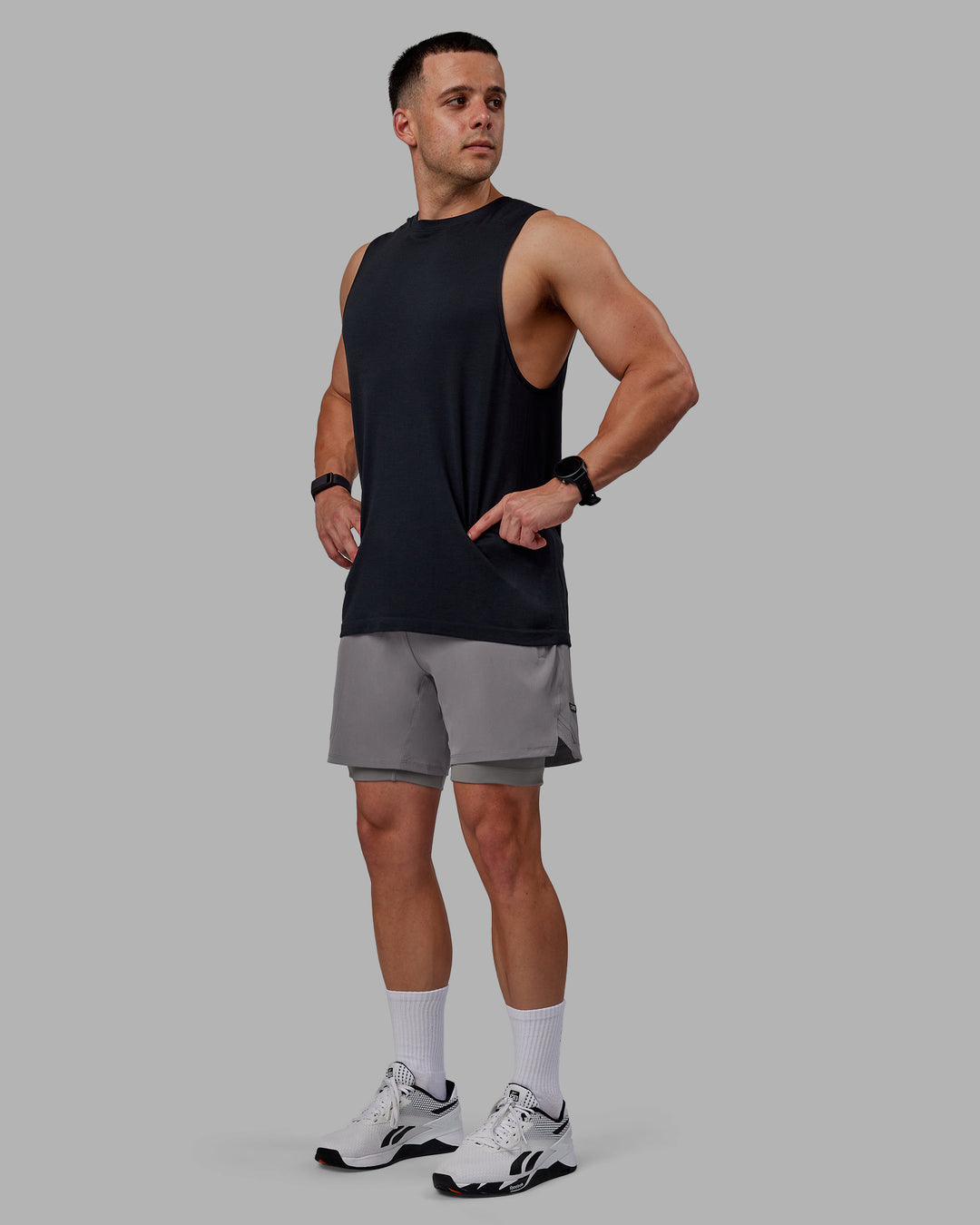 Man wearing Challenger 6&quot; Lined Performance Shorts - Storm Front